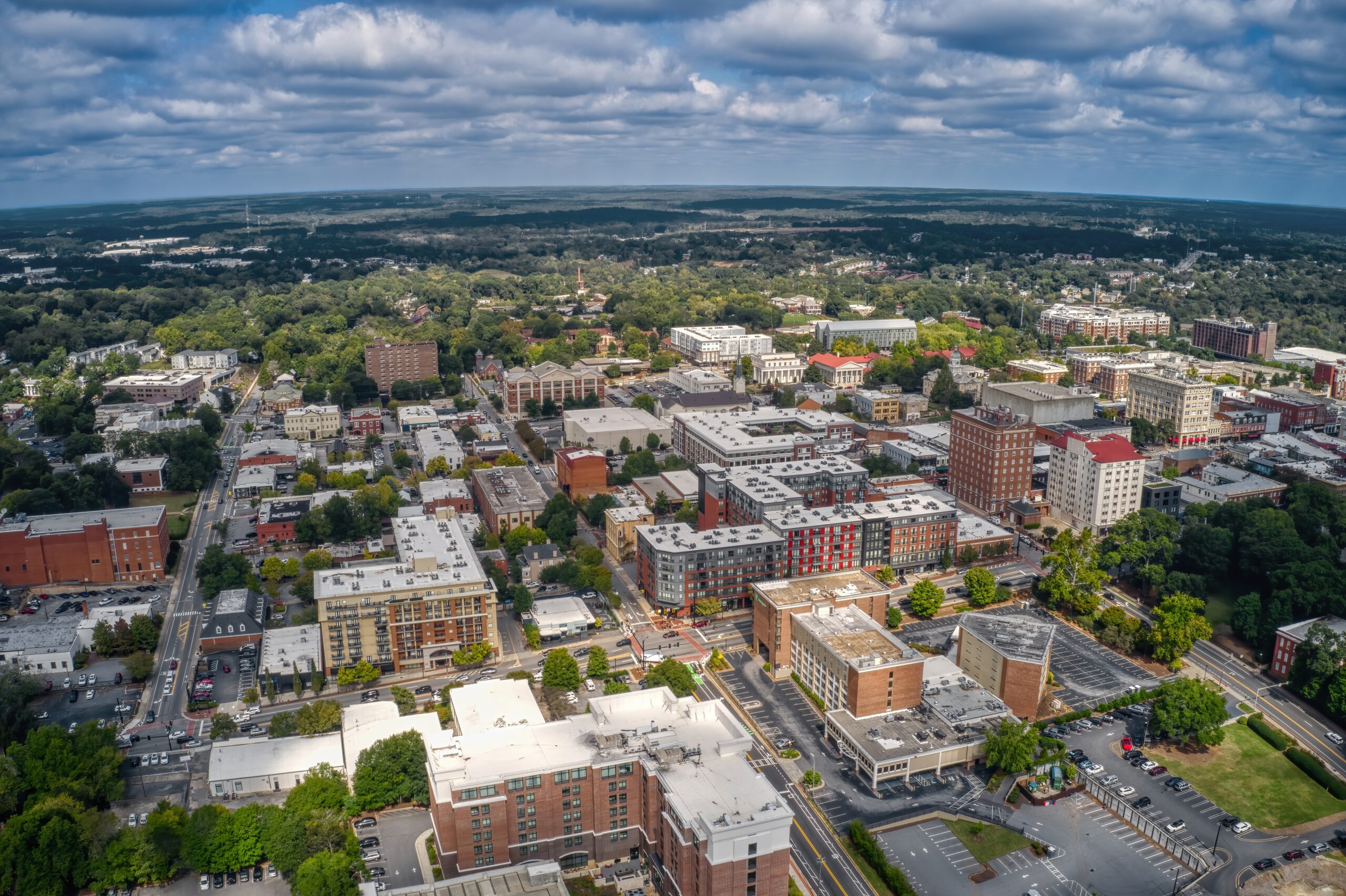Free home valuation for residential properties in Athens featuring an aerial view of homes, neighborhoods, and the local real estate market.